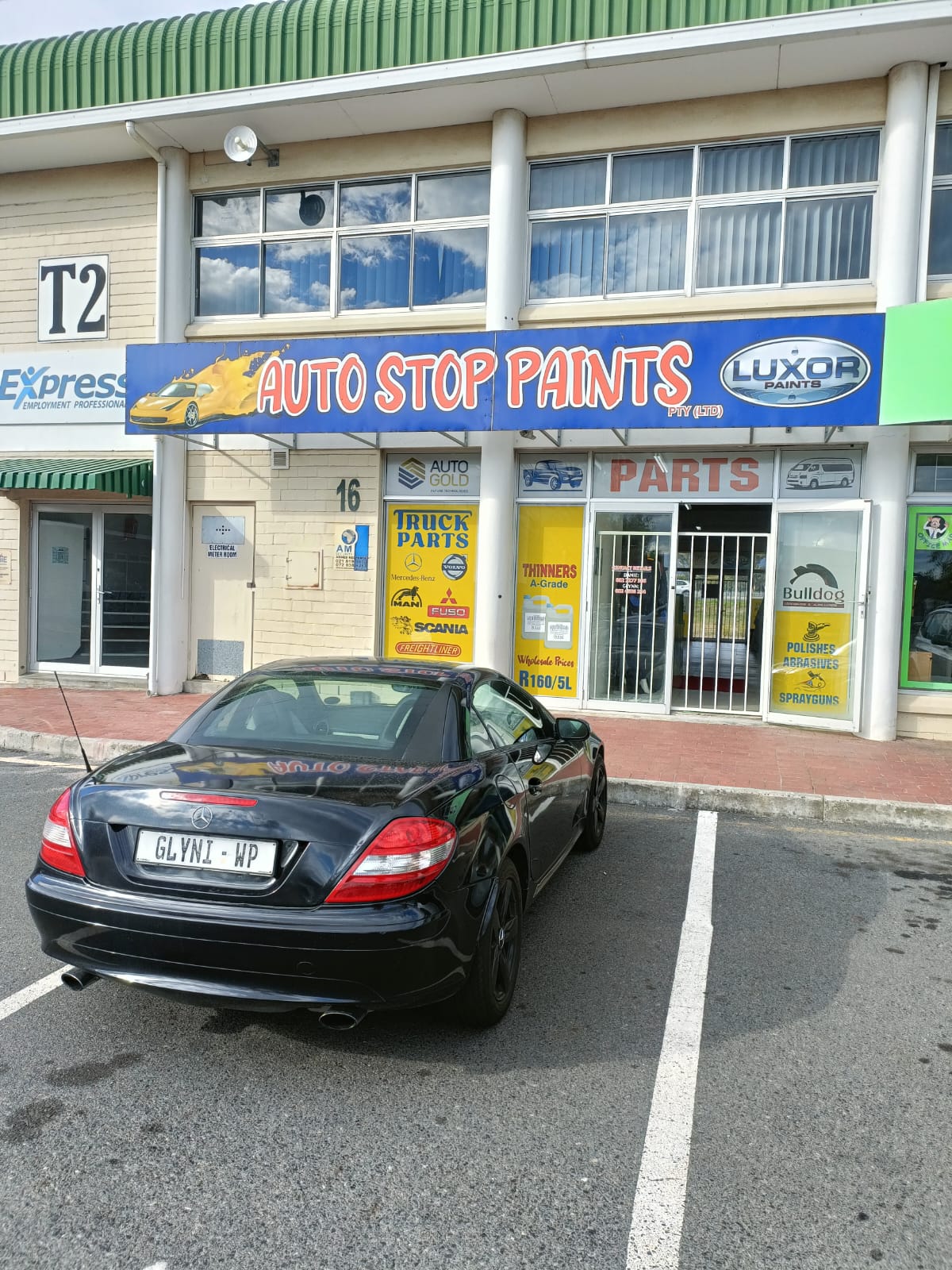 Front of Auto Stop Paints and Parts at Gants Centre in Strand
