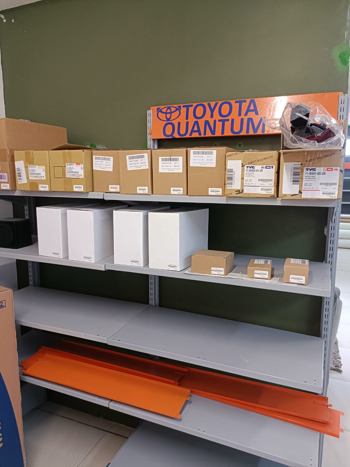 Quantum taxi body parts shelving inside Auto Stop Paints and Parts