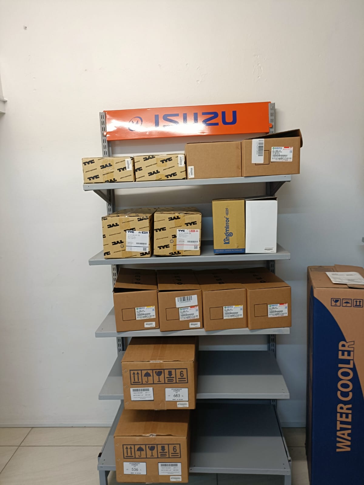 Isuzu body parts shelving inside Auto Stop Paints and Parts